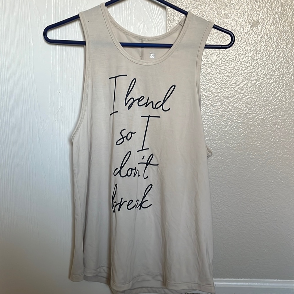 Athletic tank from target, comfy and LOOSE so could be a small too